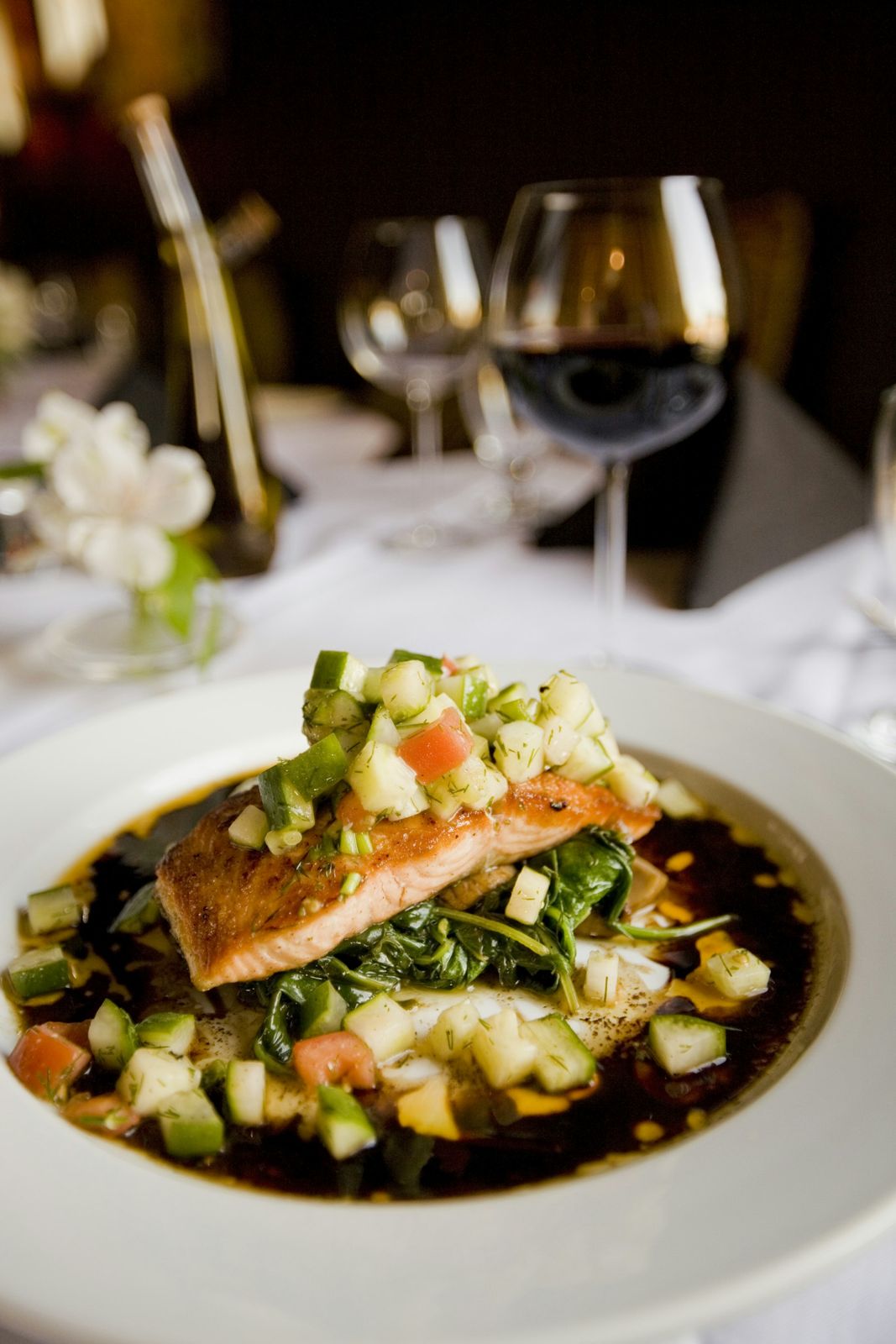 Seared salmon plated for an executive dinner